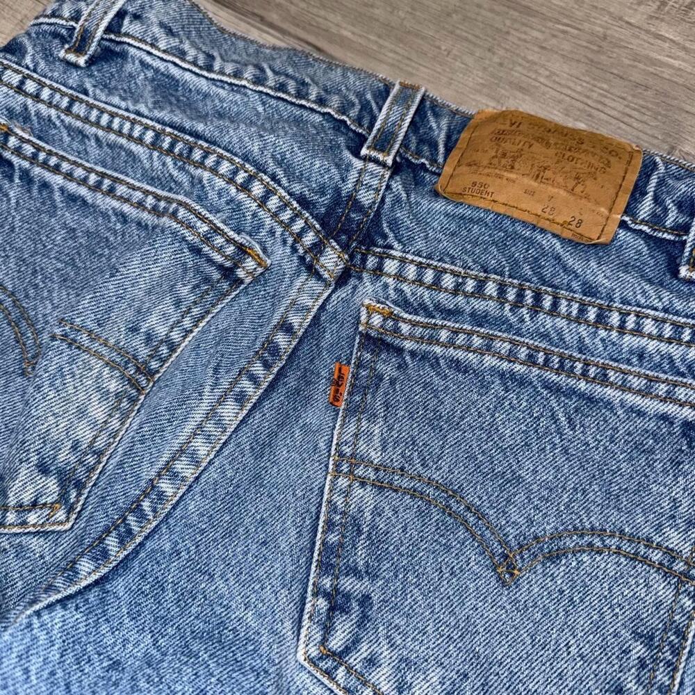 Vintage 90s Levi's 550 orange tab blue denim jeans 28x28